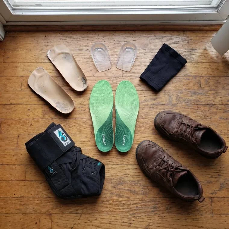 XSTANCE insoles surrounded by the graveyard of failed purchases
